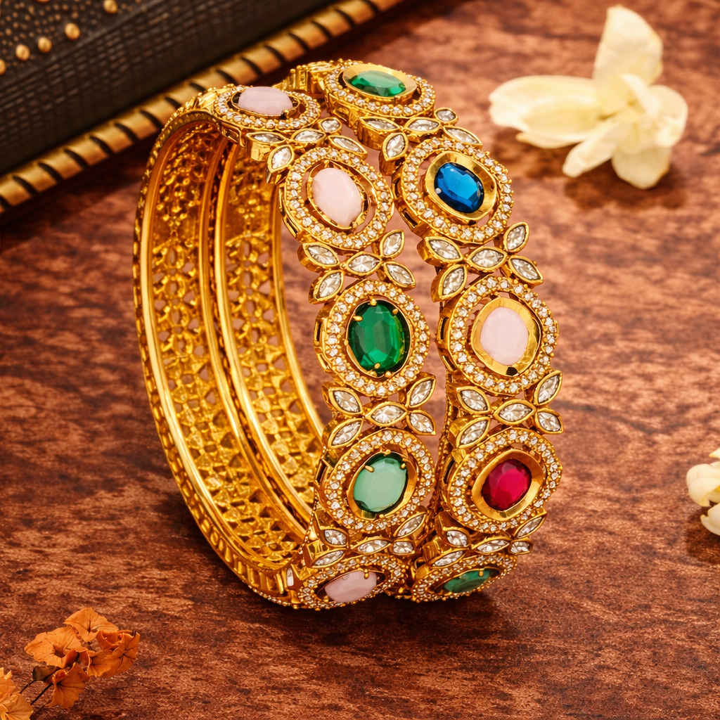 Ornate gold bangles with vibrant gemstones