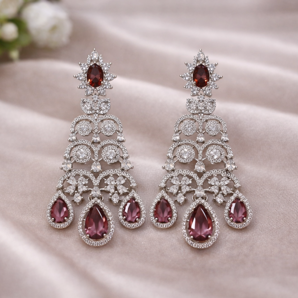 Rhodium Plated American Diamond Sparkling Dangle Earrings in silver with pink teardrop stones
